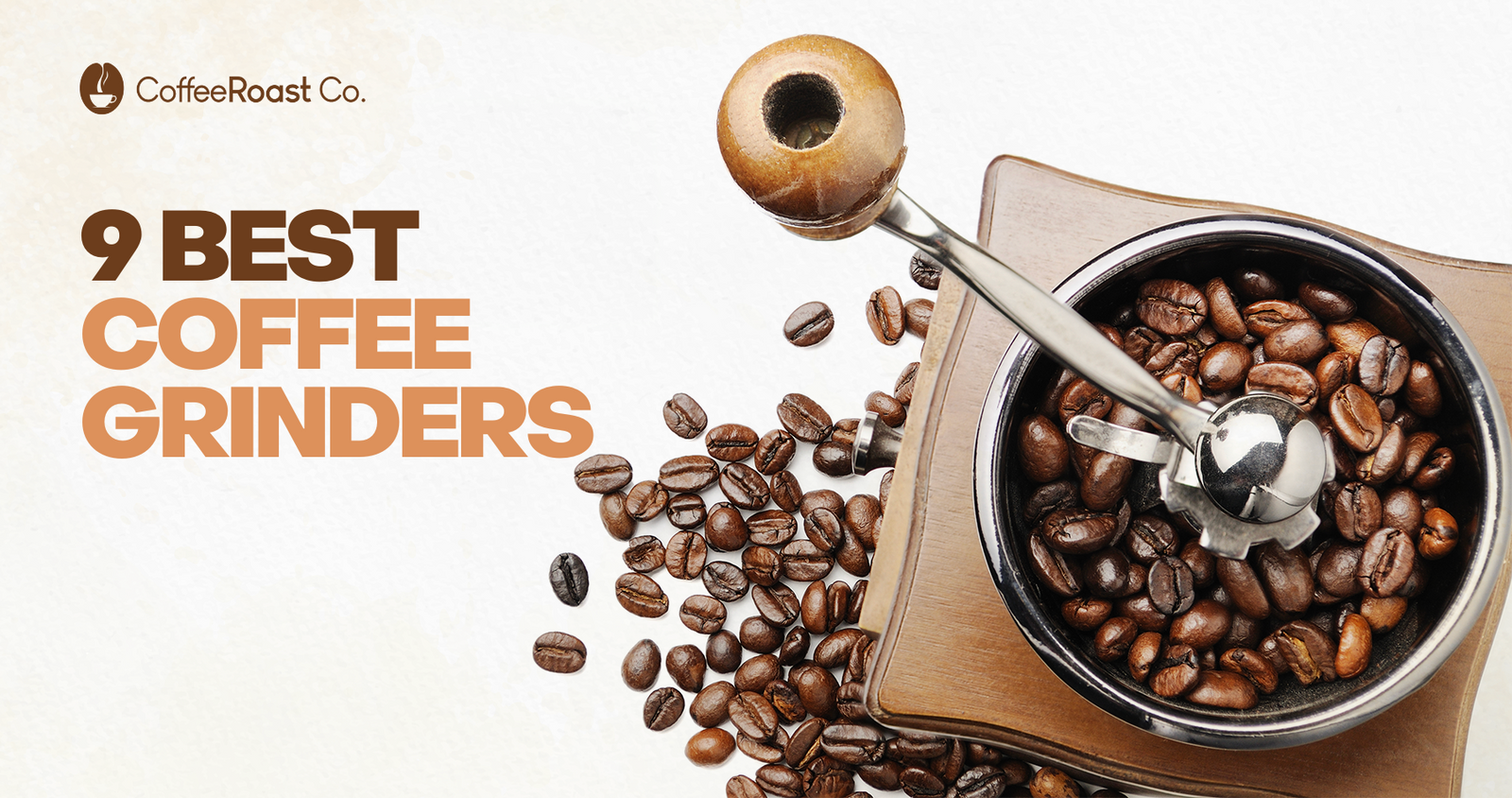 Burr coffee grinder filled with brown roasted beans and scattered beans on wooden surface