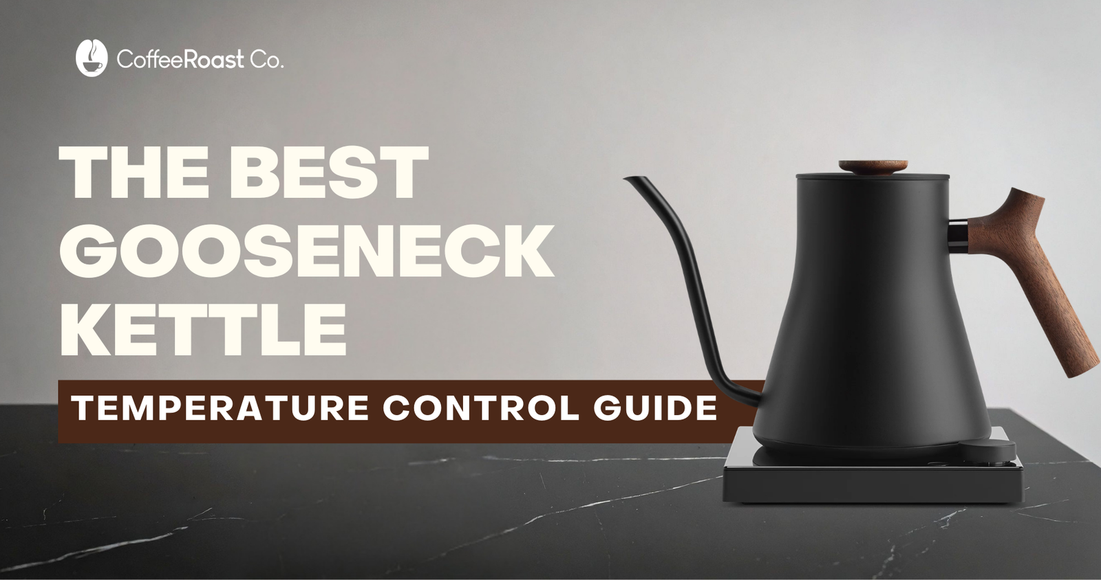 Black gooseneck kettle with wooden handle on heated base next to CoffeeRoast Co logo