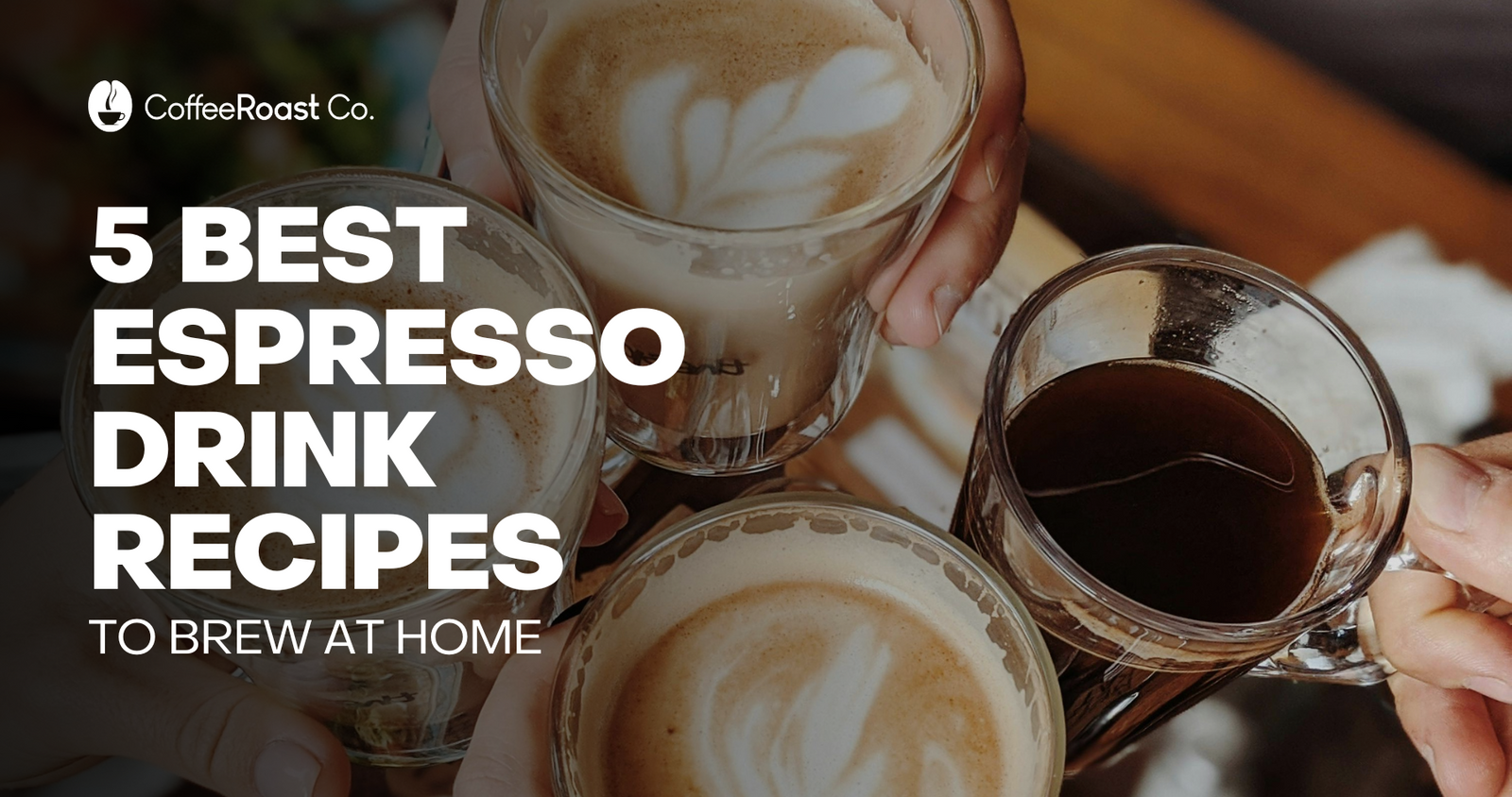 Hands holding glasses of espresso drinks with latte art and dark espresso shots