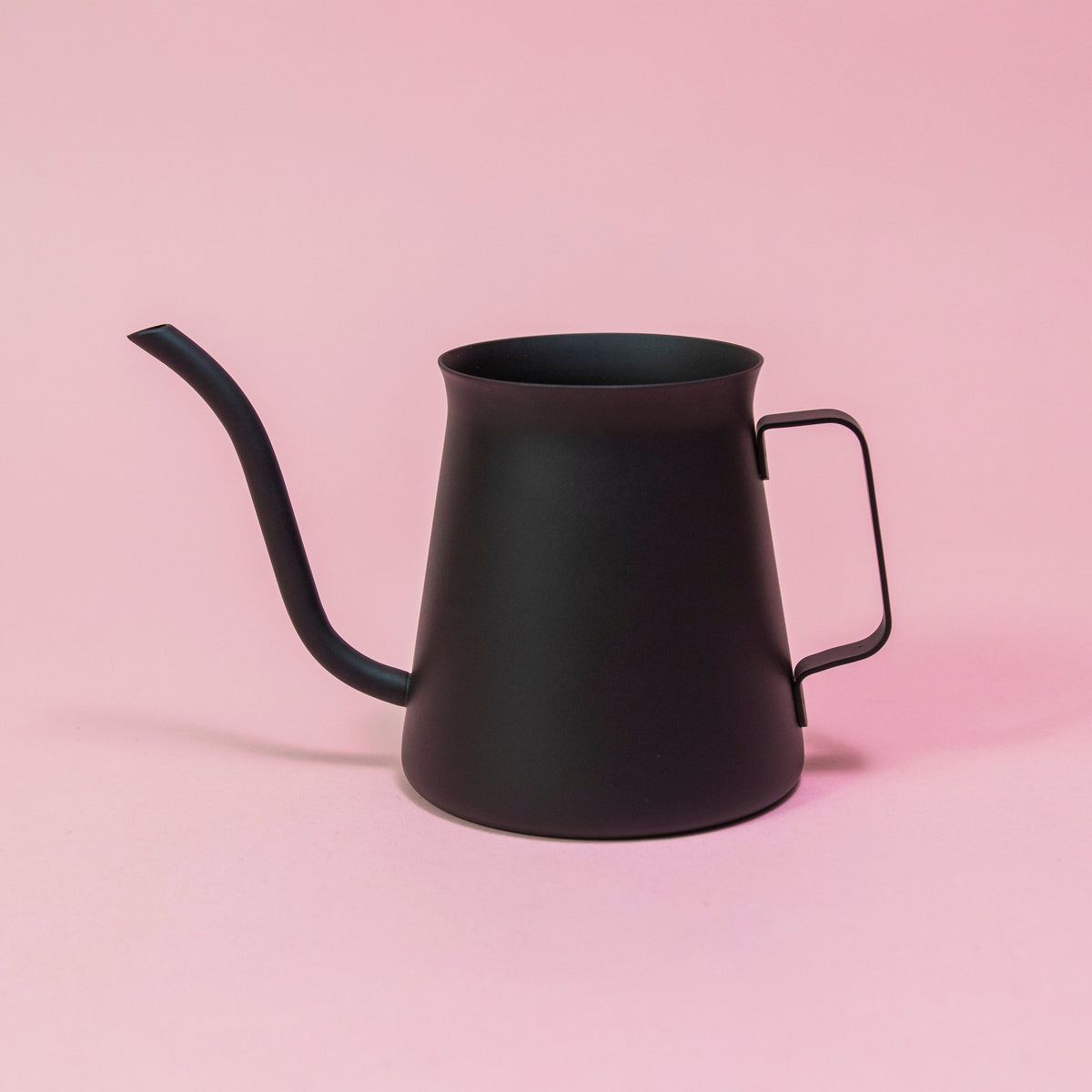 All black metal kettle with flared top, gooseneck, and handle.