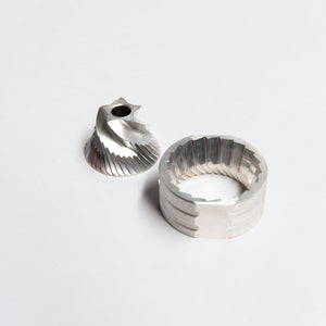 Stainless steel cone shaped inner and circular shaped outer burrs.